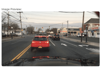 AI-Powered Image Tagging for Seamless Integration A traffic scene with cars at an intersection, illustrating AI-powered image tagging capabilities.